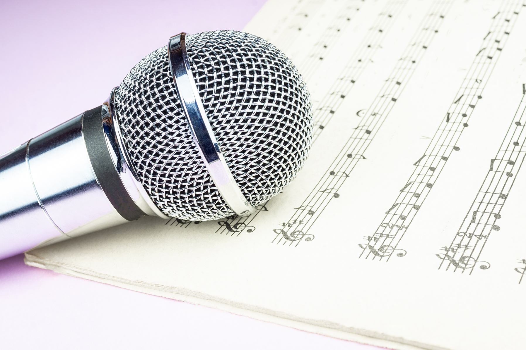 dynamic microphone on music sheet